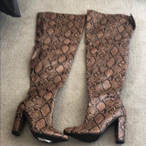 Never worn thigh high snakeskin boots